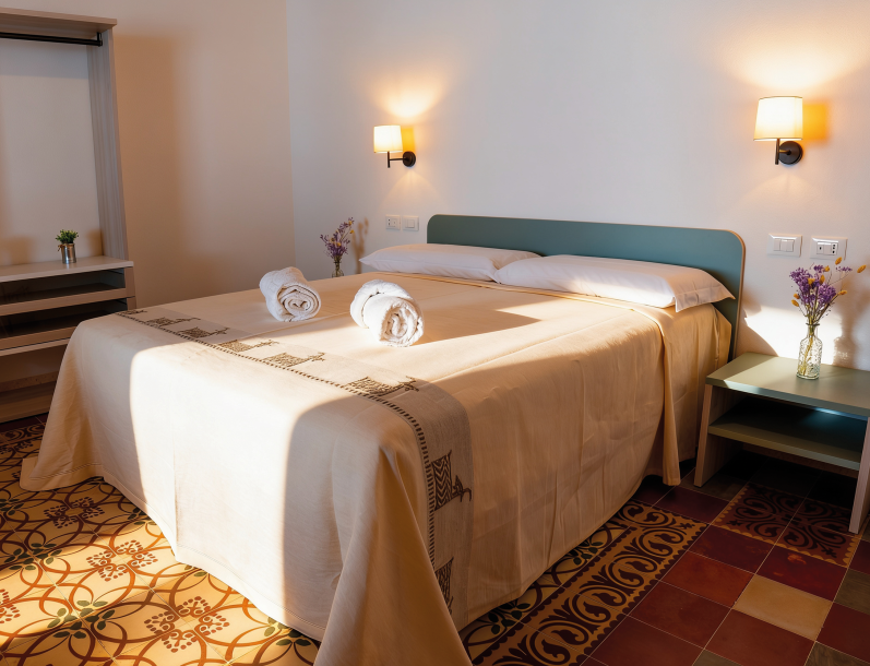 05-STANZA_ROOM_CAMERA_DORMIRE_TRIULA_VILLA_GUEST_HOUSE_OROSEI_SARDEGNA_ANTICO_GRANAIO_WINE_BAR_CAMERE_VACANZA_SPIAGGE_MARE_ESTATE_